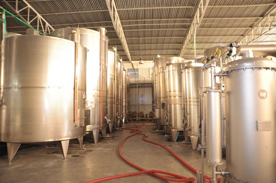 wine storage tanks at Oinodos Wines facilities